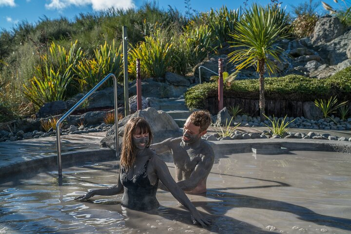 Immerse yourself in the healing properties of natural mud as you relax in serene surroundings and enjoy a unique mud spa experience surrounded by lush greenery and geothermal beauty.